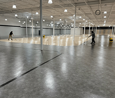 Palmetto Services team doing post-construction cleaning at a Dicks Sporting Goods